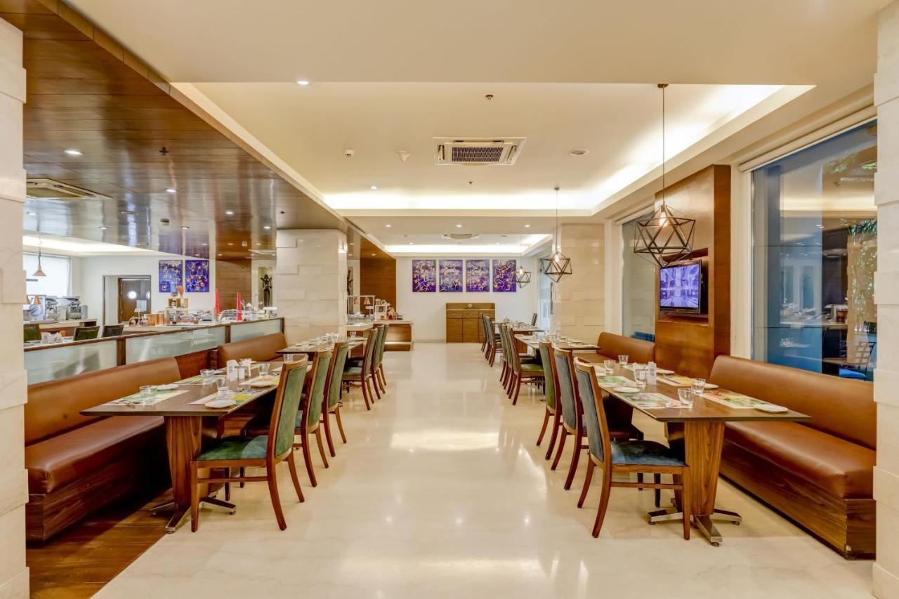 فندق ليمون تري بريمير مطار دلهي نيودلهي المظهر الخارجي الصورة The interior of the restaurant